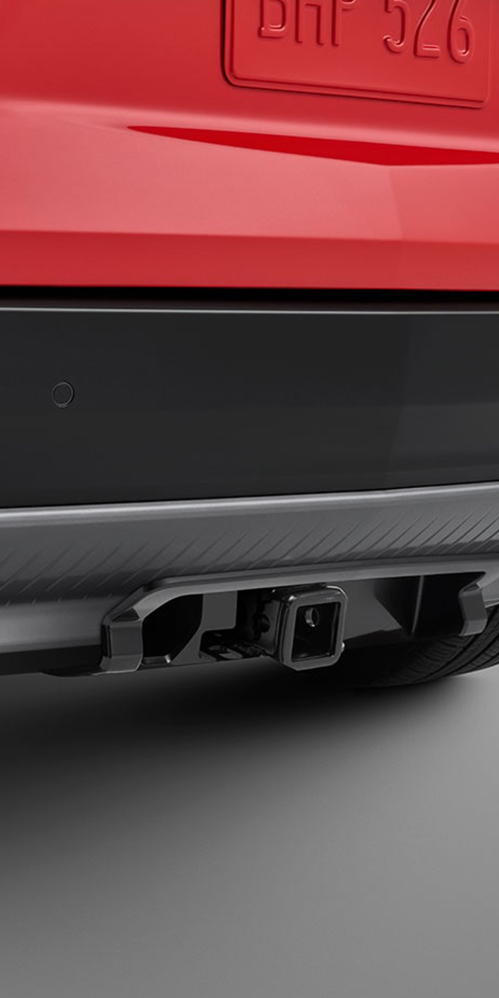 Cadillac OPTIQ 2026, cubierta embellecedora para enganche de remolque